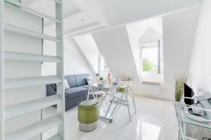 Χώρος καθιστικού στο Le Petit Victor Hugo +9 φωτογραφίες