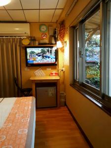 Televisyen dan/atau pusat hiburan di Yun Cheng Homestay