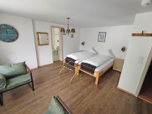 Postel nebo postele na pokoji v ubytování Hotel Restaurant Jungfrau