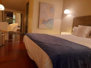 Postel nebo postele na pokoji v ubytování Hotel Ceres