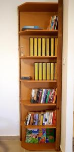 a book shelf filled with lots of books at Crater Zen in Mitzpe Ramon