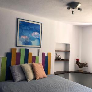 Postel nebo postele na pokoji v ubytování Maison Poppy