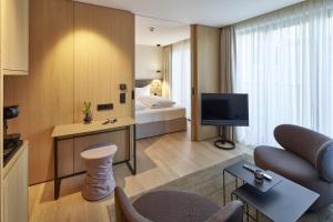 TV a/nebo společenská místnost v ubytování Hotel Misan