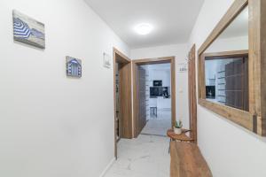 Televízia a/alebo spoločenská miestnosť v ubytovaní Spa Residence Carbona Hévíz Apartments KAKADU 203 B