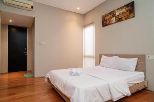 Voodi või voodid majutusasutuse Three J Residence 2 toas