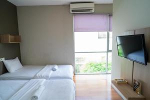Voodi või voodid majutusasutuse Three J Residence 2 toas