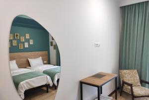 Letto o letti in una camera di Northgate Hotel Kazbegi