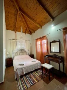Postel nebo postele na pokoji v ubytování Serenita Cottage