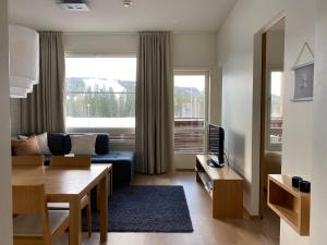 Гостиная зона в Tahko Chalets B402