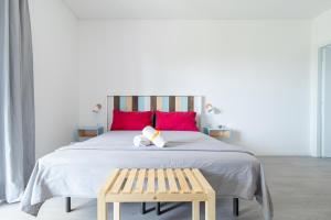 Postel nebo postele na pokoji v ubytování NeveNera