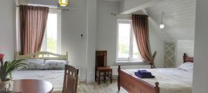 Postel nebo postele na pokoji v ubytování Conacul Mierii + 14 fotografií