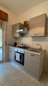 Kuchyň nebo kuchyňský kout v ubytování Appartamento da Lena