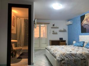 Posteľ alebo postele v izbe v ubytovaní Casa Raccuglia