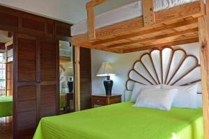 Säng eller sängar i ett rum på Casa Aramara