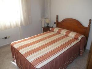 Postel nebo postele na pokoji v ubytování Hostal Los Andes