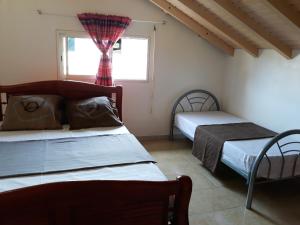 Foto da galeria de Maison de 2 chambres avec vue sur la mer terrasse amenagee et wifi a Vieux Habitants a 1 km de la plage em Vieux-Habitants