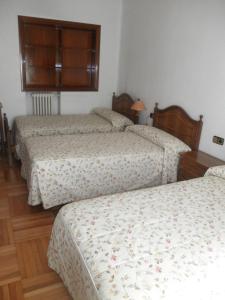 Postel nebo postele na pokoji v ubytování Hostal Los Andes