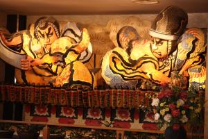 a wall with paintings of animals on it at Hotel Towadaso in Towada