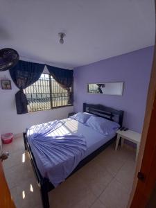 Postel nebo postele na pokoji v ubytování Hostel Shalom Adonai