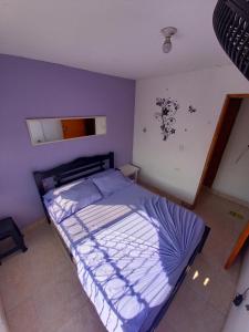 Postel nebo postele na pokoji v ubytování Hostel Shalom Adonai