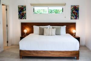 Rúm í herbergi á Aves Hotel Montezuma