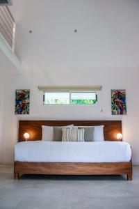 Rúm í herbergi á Aves Hotel Montezuma