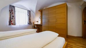 Postel nebo postele na pokoji v ubytování Apart Alpin Oetztal