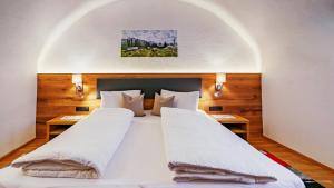 Postel nebo postele na pokoji v ubytování Apart Alpin Oetztal