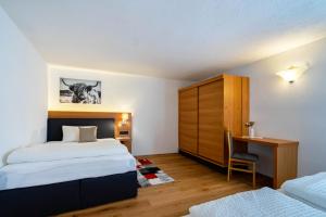 Postel nebo postele na pokoji v ubytování Apart Alpin Oetztal
