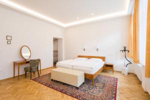 Posteľ alebo postele v izbe v ubytovaní Luxusní velký apartmán s terasou v centru Litomyšle