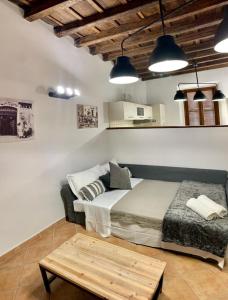 a bedroom with a bed and a coffee table at Rome center apt in Rome