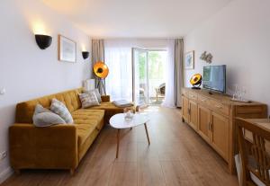TV a/nebo společenská místnost v ubytování Hotel Villa Granitz