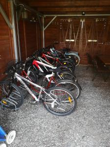 a row of bikes parked next to each other at Rivabell in Ostrowo