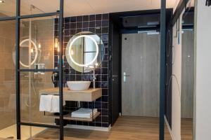 Kúpeľňa v ubytovaní H2 Hotel Budapest