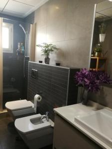 Koupelna v ubytování De paso + 22 fotografií