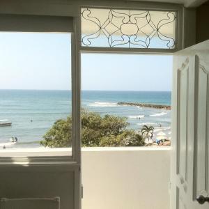 a view of the beach from a window at PLAYA LAGUITO in Cartagena de Indias