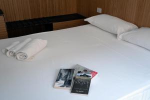 Postel nebo postele na pokoji v ubytování Sognalibro Bed and Books