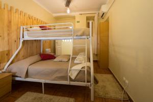 a bedroom with a bed and a desk at Beja Hostel in Beja