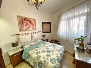 Postel nebo postele na pokoji v ubytování La Luz Vivienda Vacacional