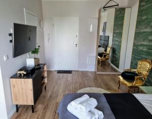 Kuchyňa alebo kuchynka v ubytovaní Apartment Jana Kazimierza Wola by Noclegi Renters