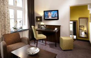 TV a/nebo společenská místnost v ubytování Boutique-Hotel Moseltor
