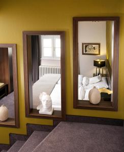 Postel nebo postele na pokoji v ubytování Boutique-Hotel Moseltor