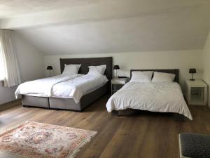 เตียงในห้องที่ B&B Het Zonnehuis Boxtel