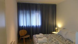 Ένα ή περισσότερα κρεβάτια σε δωμάτιο στο My Sunny Apartment Barra
