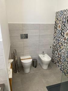Koupelna v ubytování Minioto Rooms