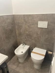 Koupelna v ubytování Minioto Rooms