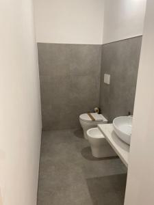 Koupelna v ubytování Minioto Rooms