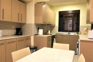 Cucina o angolo cottura di Fiore di Rodi - Private Pool, Jacuzzi and Barbecue