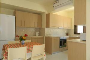 Cucina o angolo cottura di Fiore di Rodi - Private Pool, Jacuzzi and Barbecue