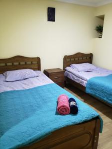 Uma cama ou camas num quarto em Guest House Nanu